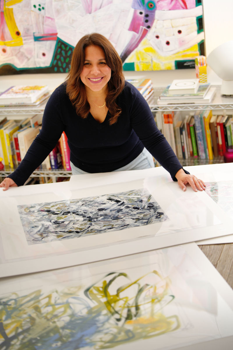abstract art painter in texas. In this photo, Maria Alejandra Ochoa (MAOF) is painting in her Allen, Texas studio.